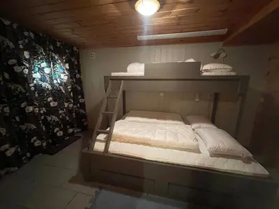 a room with a bunk bed in a room at Perfect Couple's Hideaway In Nature! in Beitostøl