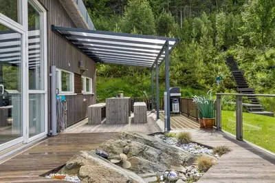 Gallery image of Luxuriøs sjøhytte med panoramautsikt in Råk