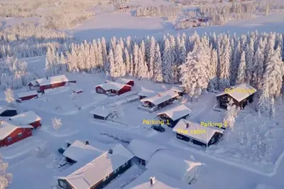 an aerial view of a farm covered in snow at Nice log house close to Lillehammer and Sjusjøen in Haugen