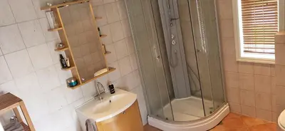 a bathroom with a shower and a sink at Dalgårdveien 5 in Trondheim