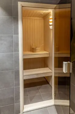a bathroom with a shower with a glass at Skistadion Hafjell in Hafjell