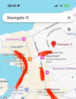 a map of shangraapa with a red marker at Downtown free parking cozy apartment in Ålesund