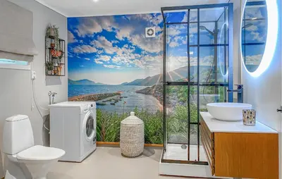 a bathroom with a view of the water at Gorgeous Home In Sørbøvågen With Wifi in Saltbu