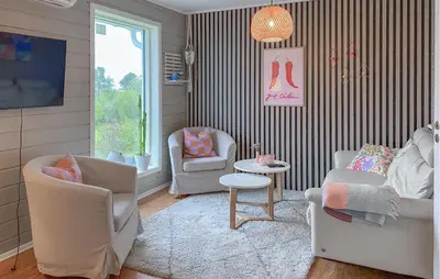 a living room with two chairs and a couch at Gorgeous Home In Sørbøvågen With Wifi in Saltbu