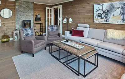 a living room with a couch and chairs and a table at 5 Bedroom Nice Home In Edland in Vågsli