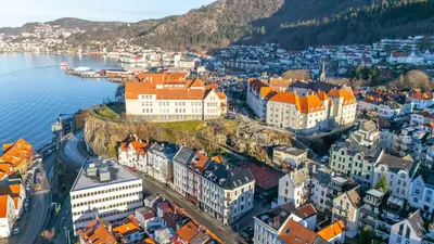 an aerial view of a city next to the water at Sentral og stilfull leilighet in Bergen