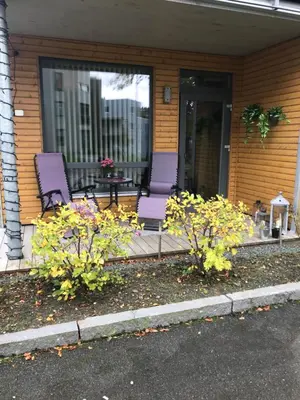 two purple chairs sitting on the porch of a house at Ski VM i Trondheim 2025 in Trondheim