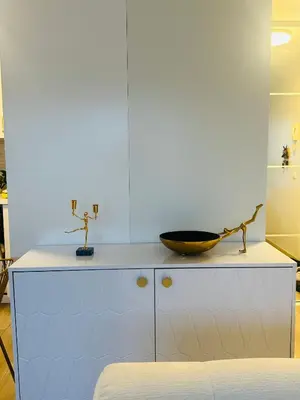 a white cabinet with a bowl on top of it at Trondheim- free parking in Høiset