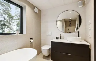 a bathroom with a sink and a mirror at Tyristua in Gjesval