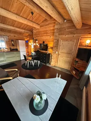 a room with a table with a hat on it at Hytte Oppdal Så Klart in Oppdal