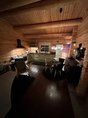 a living room with a couch and a table at Hytte Oppdal Så Klart in Oppdal