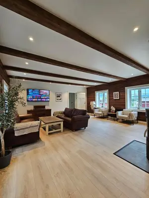 a large living room with couches and a flat screen tv at Stort hus med 2 leiligheter til leie på Lundamo, Perfekt for større grupper! in Melhus