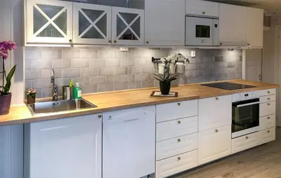 a kitchen with white cabinets and a sink at 4 Bedroom Gorgeous Home In Bagn in Bagn