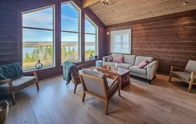 a living room with couches and chairs and windows at Gorgeous Home In Gol With Sauna in Gol