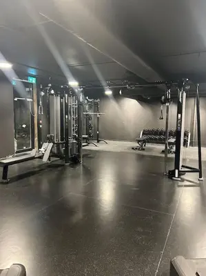 a room with a gym with machines and a bench at Ski-in ski-out - Hemsedal Fjellandsbyen in Hemsedal