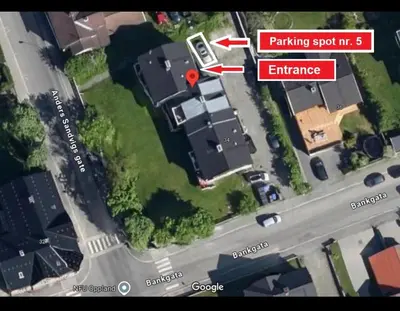a map of a house with a parking spot in at Central 2 bedroom apartment in Lillehammer
