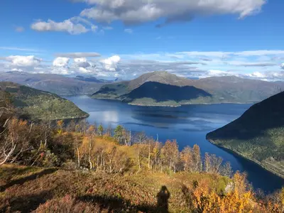 a view of a lake in the hills at Røldal a home with a view in Håra