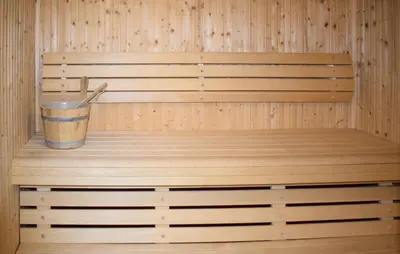 a wooden sauna with a bucket in it at Stunning Home In Trysil With Sauna in Trysil