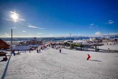 a group of people skiing on a ski slope at Old Cabin Vibe, Perfect For Families Or Couples in Beitostøl