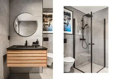 a bathroom with a shower and a sink and a mirror at Odda Trolltunga Atmosphere in Odda