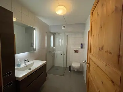 a bathroom with a sink and a shower and a toilet at Your Perfect Base In Beitostølen Sleeps 8! in Beitostøl