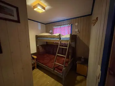 a small room with two bunk beds in it at Your Perfect Base In Beitostølen Sleeps 8! in Beitostøl