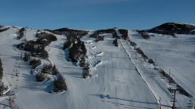 an aerial view of a ski lift in the snow at Mountain Getaway With Sauna And Views in Beitostøl