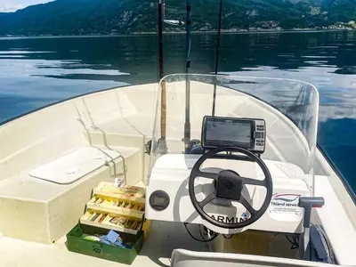a boat with a computer on the front of it at 12 person holiday home in Davik in Davik