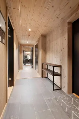 a hallway of a house with a wooden ceiling at Mosetertoppen Skistadion - Hafjell Ski Resort in Hafjell