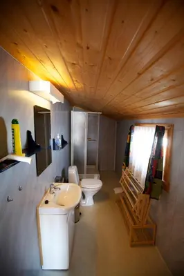 a bathroom with a sink and a toilet at Charming Cabin Ski-In Access And Pet Friendly in Beitostøl