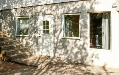 a house with a door and a window at Gorgeous Apartment With Wifi in Godvik
