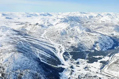 an aerial view of a snow covered mountain range at Hemsedal Mountain Retreat in Hemsedal