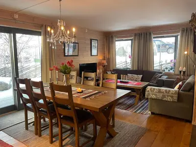 a living room with a table and a couch at A Family-Friendly, Pet-Friendly Getaway In Beitostølen Center in Beitostøl