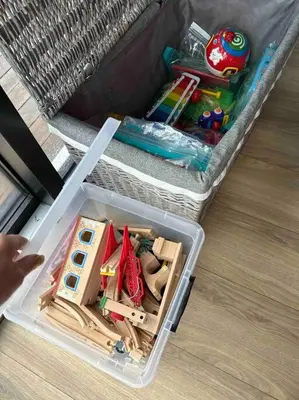 a plastic container filled with toys on the floor at Panorama ski inn out, jacuzzi,Badstu in Kvam
