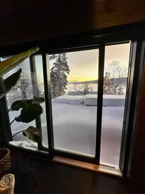 a window with a view of a snow covered yard at Panorama ski inn out, jacuzzi,Badstu in Kvam