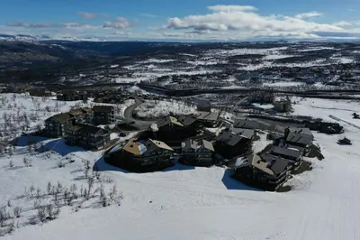 an aerial view of a town in the snow at Kikut Panorama Geilo Ski-in Ski-out in Geilo