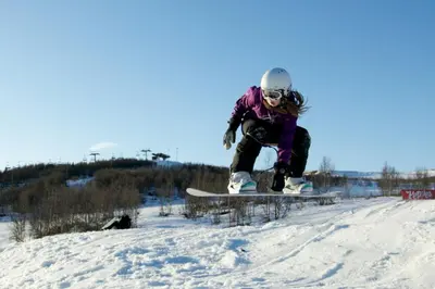 a person doing a trick on a snowboard in the air at Relaxing Getaway Sauna,Terrace and Pet friendly in Beitostøl