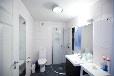 a bathroom with a toilet and a sink and a shower at Ideal Getaway For Couples Or Small Families in Beitostøl