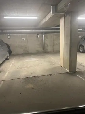 a parking garage with two cars parked in it at Ski VM 2025 in Trondheim