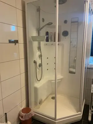 a shower with a glass door in a bathroom at Ski VM 2025 in Trondheim