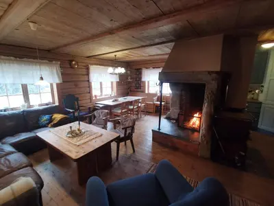 an overhead view of a living room with a fireplace at Brattland Sæter in Strond