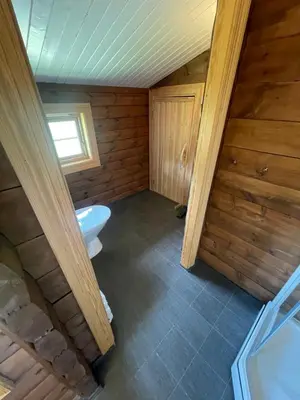 an overhead view of a bathroom with a toilet at Koselig hytte på Beito in Beitostøl