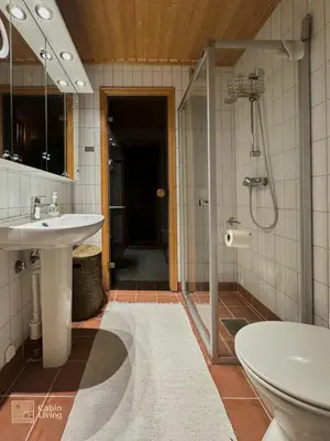 a bathroom with a sink and a shower and a toilet at Apartment at Hafjell by Gaia ski-in out in Hafjell