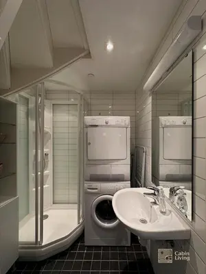 a bathroom with a sink and a washing machine at Modern apartment Hovden ski in-out x-skiing, 2 bathrooms and balcony in Hovden