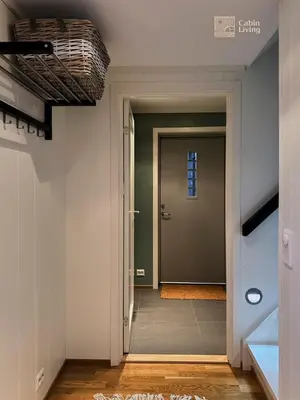 a hallway with a door in a room at Modern apartment Hovden ski in-out x-skiing, 2 bathrooms and balcony in Hovden