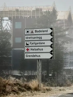 a street sign in front of a building at Modern apartment Hovden ski in-out x-skiing, 2 bathrooms and balcony in Hovden