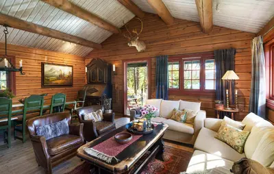 a living room with a couch and chairs and a table at Amazing Home In Hovet With Sauna in Hovet
