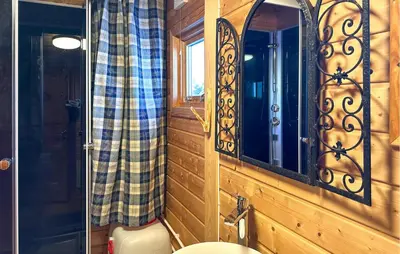 a bathroom with a toilet and a mirror at Lovely Home In Sjusjøen With Wifi in Sjusjøen