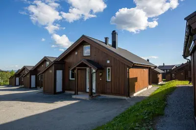 a row of houses with a garage at Perfect Base For Skiing And Local Events in Beitostøl