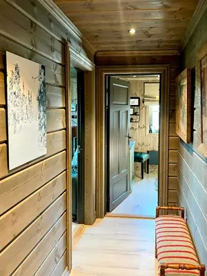a hallway with a door and a bench in a house at Family Cabin With Ski-Inski-Out In Trysil in Trysil